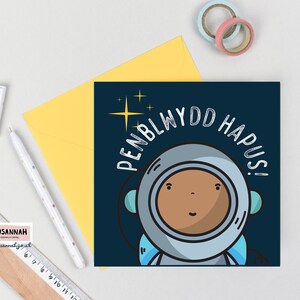 Penblwydd Hapus- Tarjeta de cumpleaños galesa- Astronauta espacial- Cardiau Cymraeg