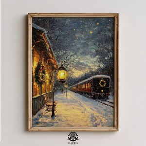 May include: A framed winter landscape painting depicts a snow-covered train station at night. A vintage train with lit windows and a wreath is on the tracks. A lamppost and building are lit with warm light, and a bench is visible.