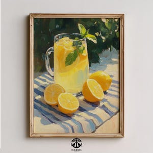 May include: A framed painting of a refreshing summer drink. A clear glass pitcher filled with lemonade and mint leaves sits on a blue and white striped surface. Halved and whole lemons are scattered around the pitcher. The background features green foliage.