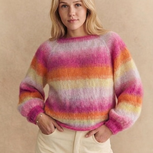 May include: A rustic wooden sign with the text "Welcome to our home" in white lettering. The sign features a distressed finish and a simple, inviting design, perfect for front door decor.