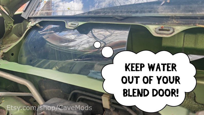 May include: An olive green car component with a clear windshield. A thought bubble with the text "KEEP WATER OUT OF YOUR BLEND DOOR!" is on the right. The Etsy shop name is visible at the bottom.