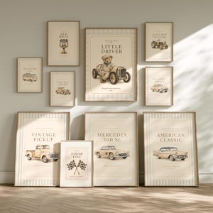 May include: A collection of framed vintage car prints. The prints feature illustrations of classic cars, a tractor, and a teddy bear driving a race car. The color palette includes beige, brown, and cream tones, with text such as "Vintage Pickup" and "American Classic".