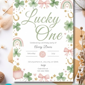 May include: A pastel-colored birthday party invitation with the text "Lucky One." The design includes shamrocks, rainbows, bows, and a pot of gold. The invitation is for Avery Davis's birthday on July 25th. The bottom of the invitation says "Editable Invitation."