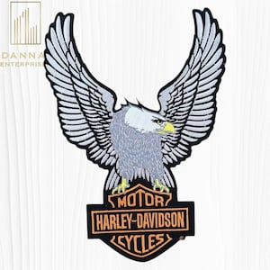 May include: Embroidered patch featuring a detailed eagle with outstretched wings. The eagle is gray, white, and yellow, with a black border. Below the eagle is the Harley-Davidson Cycles logo in orange and black.