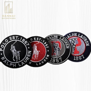 May include: Four embroidered patches with the text "POLO EST. 1967 RALPH LAUREN" and "RALPH LAUREN 1967". The patches feature a polo player logo and the letter "P". Colors include black, red, white, and gray.