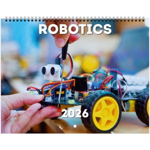 May include: A spiral-bound calendar with the word "ROBOTICS" in white block letters at the top. The image shows a person working on a small robot with yellow wheels and the year "2026" printed on the calendar.