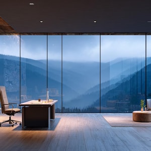 May include: An office interior with a large window offering views of a mountain range. The room includes a desk, a chair, and a seating area with armchairs and a coffee table. A stone fireplace and wooden floor add warmth.