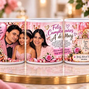 May include: Three white ceramic mugs featuring pink-themed birthday graphics, including photos of a family, a decorated cake, and text in Spanish such as Feliz Cumplea&ntilde;os, Sue&ntilde;a Rie Vive Se Feliz, and T&uacute; pap&aacute; y t&uacute; tia te aman, with floral accents.