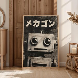 a large black and white photograph of a robot with a robot head, displayed prominently in a room with a wooden door and a mirror.