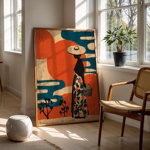a large, colorful painting of a woman in a hat and dress, standing in front of a window with a potted plant on the sill. The painting is framed and placed on a wooden floor, with a woven chair nearby.