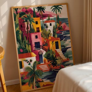 a large, colorful painting of a tropical village with palm trees, buildings, and a body of water.