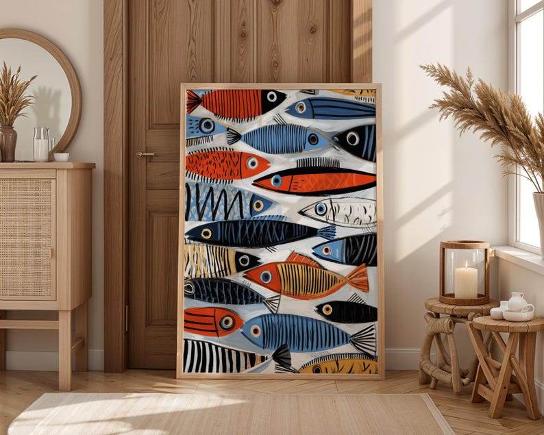 a large, colorful painting of fish displayed in a room with a wooden door and a mirror.