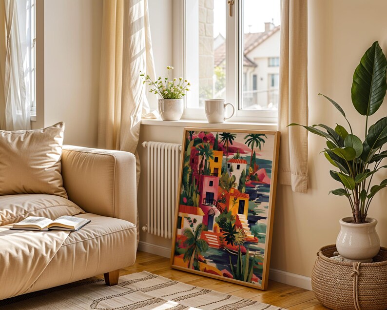 a cozy living room with a beige sofa, a large painting of a colorful tropical scene, and a potted plant. The room has a window with curtains, and there are two cups on a windowsill.