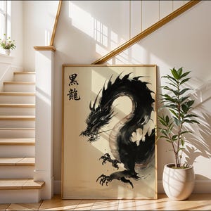 a large black dragon painting displayed on a wall, with a potted plant and a staircase in the background.