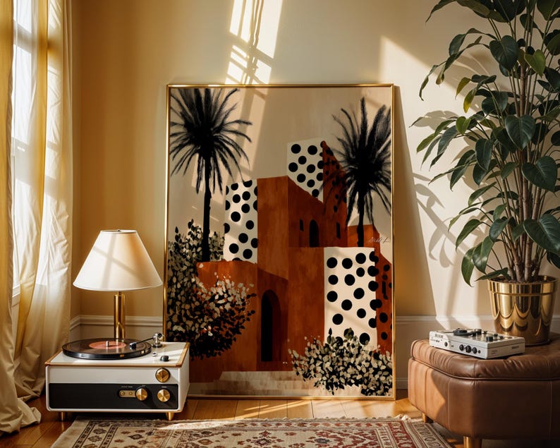 a living room with a large framed artwork depicting a tropical city scene with palm trees and buildings, a lamp, a record player, and a potted plant.