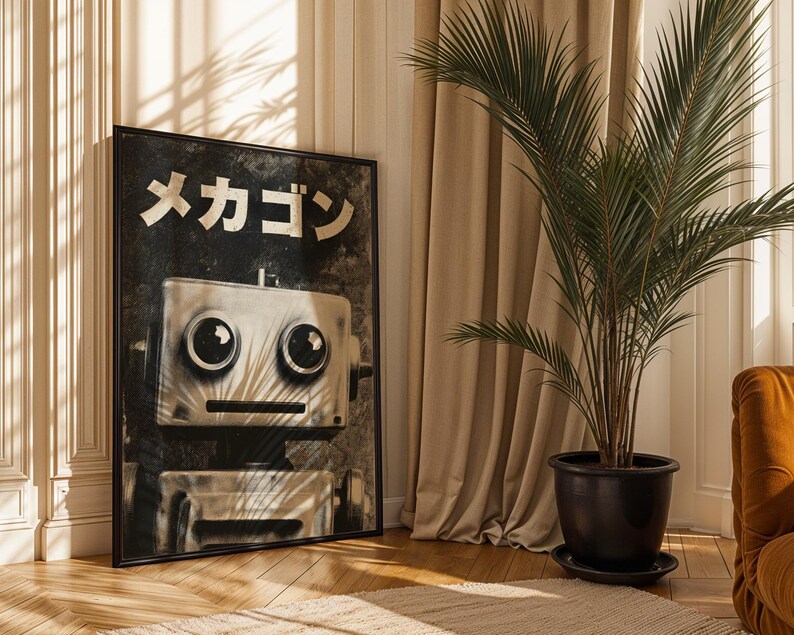 a large black and white poster of a robot with a face, placed on a wooden floor next to a potted plant.