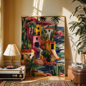 a vibrant, colorful painting of a tropical village, with palm trees, buildings, and water, displayed in a living room setting.