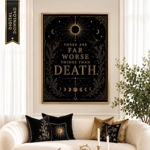 May include: A rectangular wall art print featuring a black background with gold celestial motifs, including a sun, moon phases, and stars. The text reads: THERE ARE FAR WORSE THINGS THAN DEATH. The design is framed by delicate gold botanical vines.