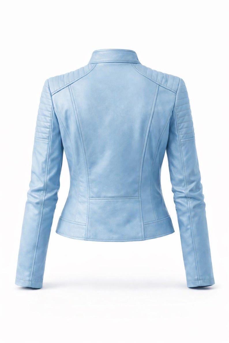 May include: A light blue leather jacket with a stand-up collar and quilted shoulder detailing. The jacket has a fitted silhouette with a slightly flared waist and long sleeves. The back view shows the jacket's design.