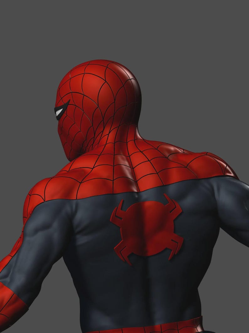 May include: A detailed view of a superhero costume, featuring a red and black color scheme. The red sections include a web-like pattern on the head and shoulders. A red spider emblem is prominently displayed on the back of the suit.