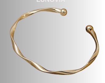 Bracelet Manchette Ouverte Torsadée en Or au Design Minimaliste en Métal Poli