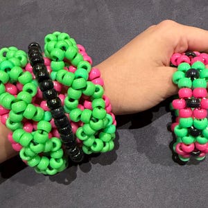 black and green Kandi rotater cuff