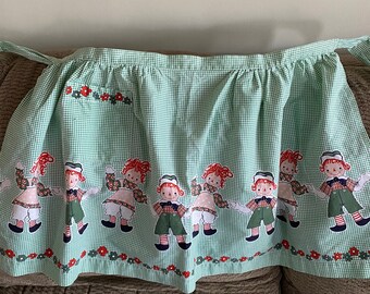 Raggedy Ann and Raggedy Andy Adult Half Apron Green and White Gingham, Red and Green Flower Border, Raggedy Ann and Andy Repeated One Pocket