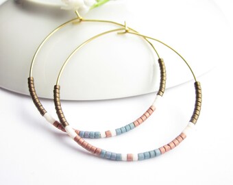 Stainless steel hoop earrings delicate with Miykuki beads in blue copper bronze