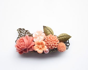 small flower hair clip coral colored
