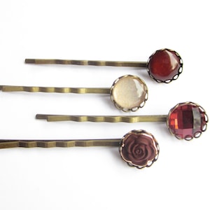 Set of 4 hair clips in dark red and gold tones