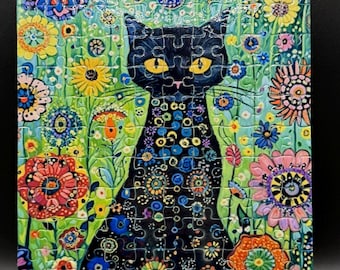 Rompecabezas de arte de gato negro en el jardín estilo Klimt