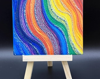 Espectro completo del arcoíris en un mosaico