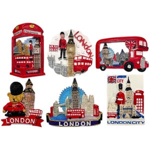May include: A collection of six London-themed souvenir magnets. The magnets feature iconic London imagery, including a red telephone booth, Big Ben, a double-decker bus, and a bear in a guardsman uniform. Each magnet has the word "London" or "London City".