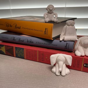 Pack de 4 minifiguras de Towel Buddies inspiradas en cruceros: recuerdos de Evie, WALL-E, mono y elefante.