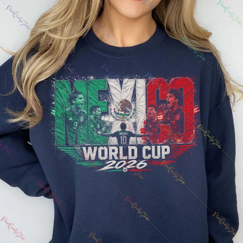 May include: A navy blue crewneck sweatshirt featuring a graphic print of the Mexican flag in green, white, and red. The design includes silhouettes of soccer players, the text MEXICO, WORLD CUP, and 2026, along with a small soccer ball icon.