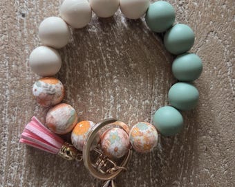 Llavero de pulsera / Pulsera de silicona con cuentas y diseño floral naranja / Llavero tipo pulsera / Llavero con cuentas / Regalo de Navidad / Regalo de cumpleaños / Llavero