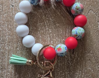 Llavero de pulsera / Pulsera de silicona con cuentas y estampado floral azul / Llavero tipo pulsera / Llavero con cuentas / Regalo de Navidad / Regalo de cumpleaños / Llavero
