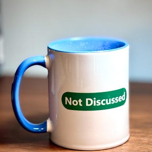 Ej diskuterad mugg – Keramisk kaffekopp för akademiker, forskare och bidragsmottagare