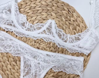 Conjunto de lencería de encaje sin entrepierna, sujetador de encaje floral con copa abierta y tanga abierta, ropa interior sexy blanca transparente, lencería erótica de encaje nupcial, media copa