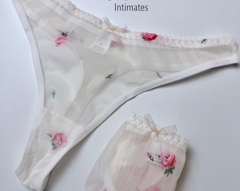 Tanga de malla transparente con estampado floral y de corazones para mujer: braguitas suaves con ribete de encaje elástico, tanga de bikini transparente, ropa interior femenina estampada.
