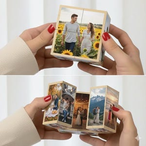 Op de afbeelding: Een houten fotopuzzel met meerdere afbeeldingen van stellen op verschillende locaties. De kubus wordt vastgehouden door een persoon met rode nagellak. De afbeeldingen tonen een stel in een zonnebloemveld en andere romantische scènes.