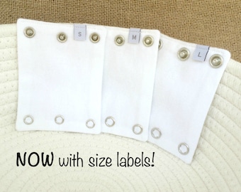 Förlängare för babykläder. Passar vanliga bodyer på långa bebisar. Ger längd åt nästan alla märken av bodyer.