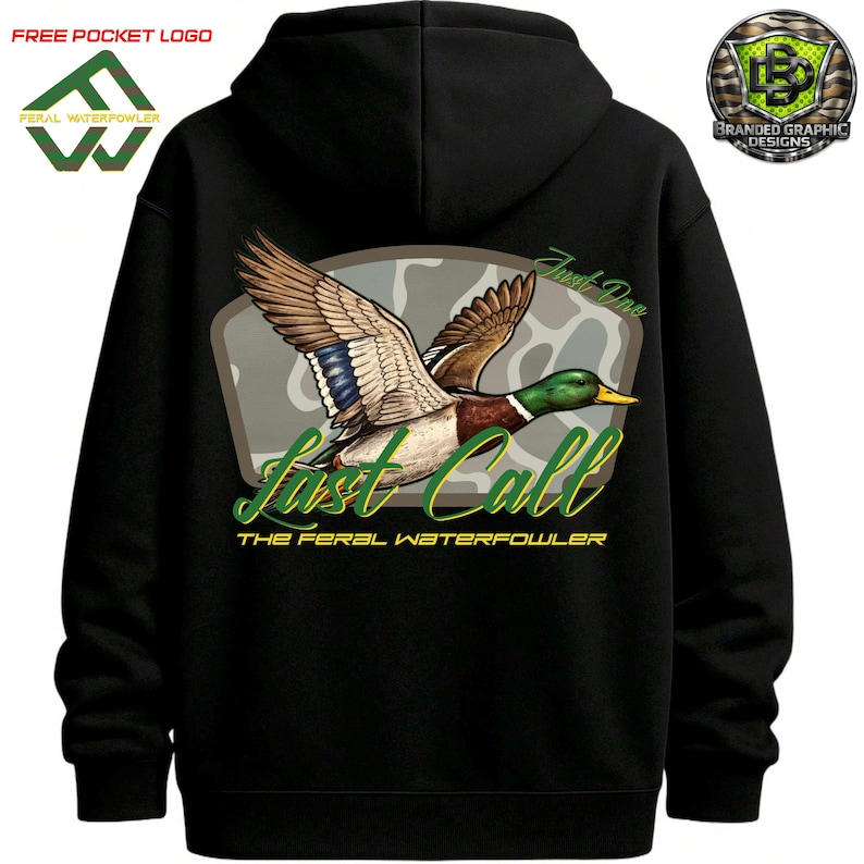 May include: Black hooded sweatshirt with a graphic of a flying mallard duck. The duck is brown, green, and blue, set against a camouflage background. Text reads "Last Call" and "The Feral Waterfowler."