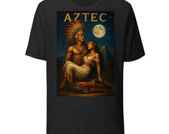 May include: Dark gray t-shirt featuring a graphic of an Aztec couple with a red car, a full moon, and a pyramid under a starry night sky. The word "AZTEC" is printed at the top.