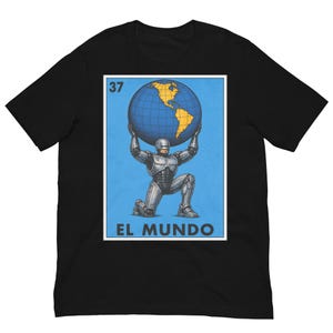 May include: A black t-shirt featuring a graphic print of a silver cyborg kneeling and holding a blue and yellow globe above its head. The design is framed like a card with the number 37 in the top left corner and the text EL MUNDO at the bottom.