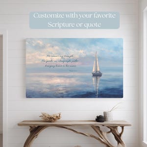 May include: A canvas print depicting a tranquil seascape with a sailboat on still water, mirroring the sky's hues. The text includes "He renews my strength" and "Customize with your favorite Scripture or quote". The artwork conveys a sense of calm.