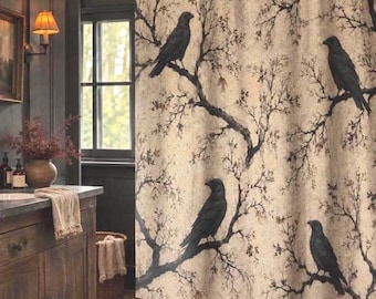May include: A shower curtain featuring a beige background with a dark brown pattern of bare tree branches and four black crows perched on the limbs. The fabric has a textured appearance and hangs from a metal rod above a bathtub.