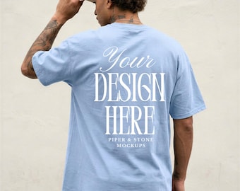 Gildan 5000 mens light blue t-shirt mockup, back view, male lifestyle, streetwear, minimal, oversized, man, POD, print on demand