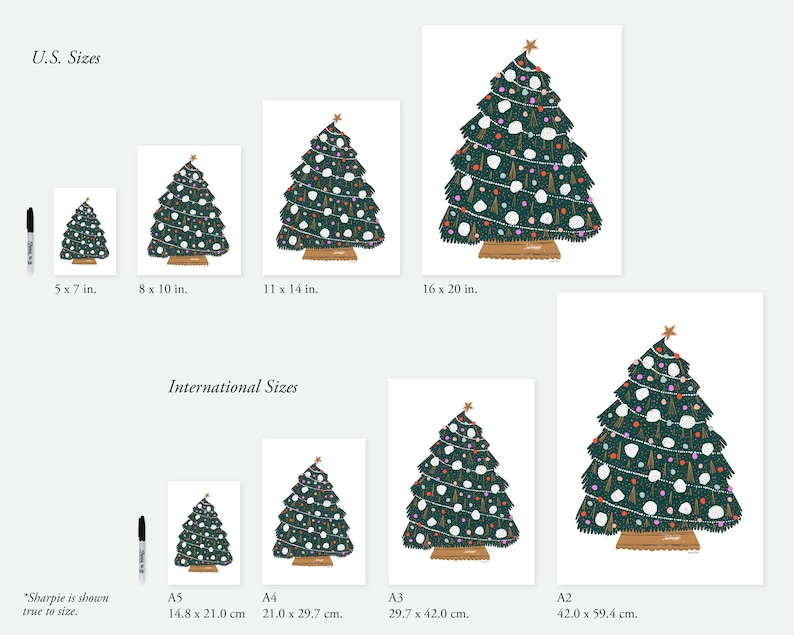 May include: A chart showing different sizes for a Christmas tree print. The print features a green Christmas tree with white snowballs, colorful ornaments, and a gold star on top. The chart shows sizes in inches and centimeters.