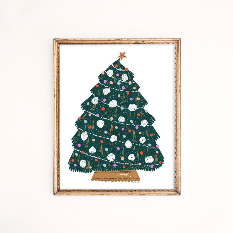 May include: A green Christmas tree with white, pink, and orange ornaments, a gold star on top, and a gold string of lights. The tree is on a brown stand with a white background.